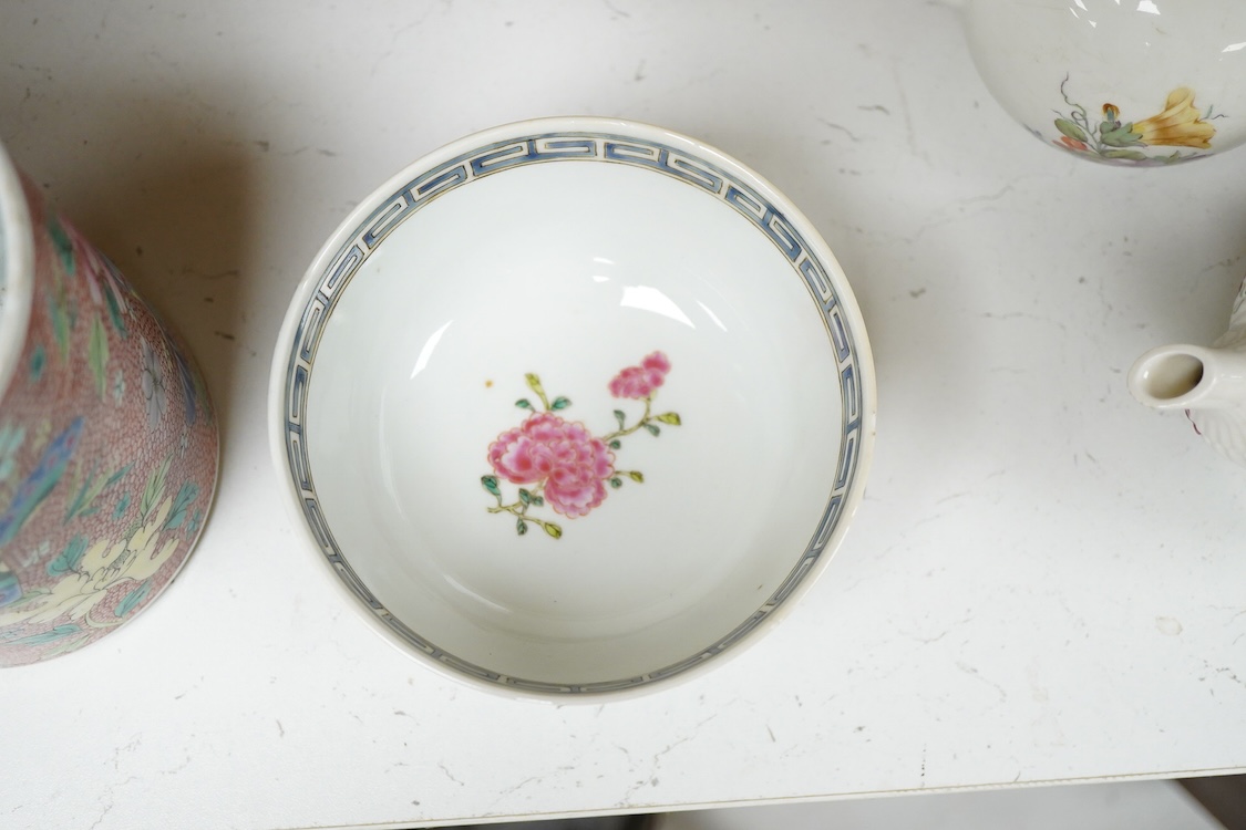 A Chinese famille rose bowl enamelled with a chicken amongst flowers, 12.5cm in diameter